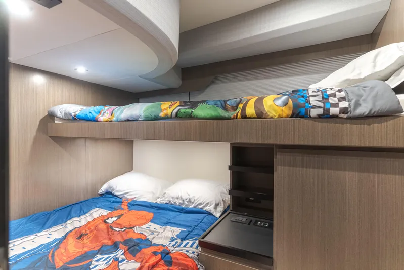 Saigon Yacht Photos Pics Bunk beds in 2023 OKEAN 52 Fly yacht cabin with colorful bedding.