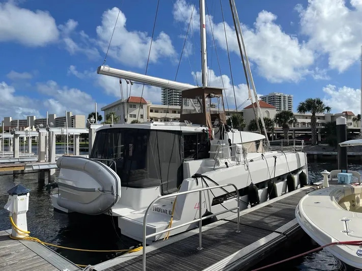 Encore Yacht Photos Pics Bali 4.1 catamaran docked at marina, 2020 model, clear sky background.