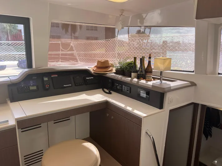 Encore Yacht Photos Pics Interior of 2020 Bali 4.1 yacht with navigation station and decor.