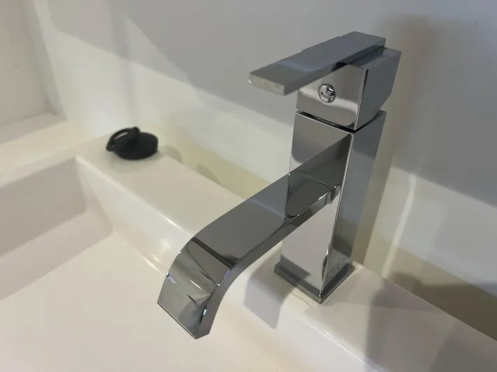 Encore Yacht Photos Pics Modern chrome faucet on white sink, Bali 4.1 model, 2020 design.