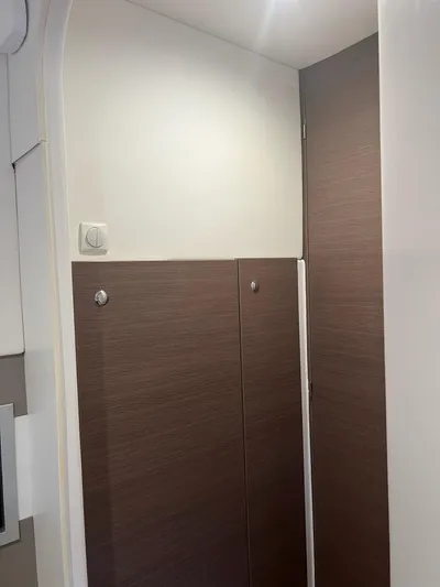 Encore Yacht Photos Pics Interior of a 2020 Bali 4.1 yacht with wooden paneling.