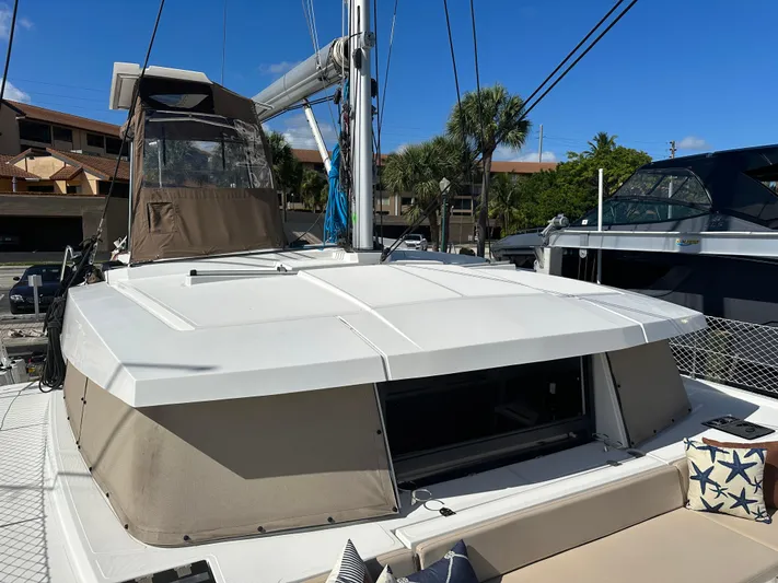 Encore Yacht Photos Pics Bali 4.1 catamaran, 2020 model, docked with clear blue sky background.