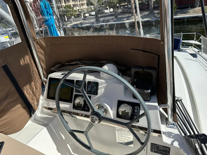 Encore Yacht Photos Pics Steering wheel and dashboard of a 2020 Bali 4.1 boat.