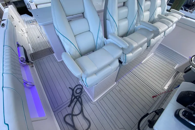  Yacht Photos Pics Luxurious seating on 2021 Regal 38 SAV boat with modern interior design.