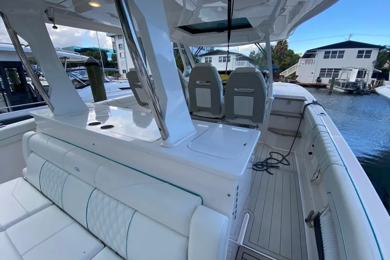  Yacht Photos Pics 2021 Regal 38 SAV boat interior with luxurious seating and modern design.