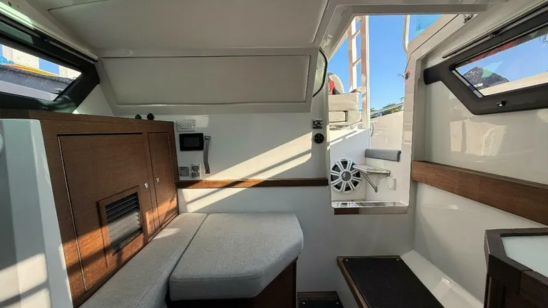 No Name Yacht Photos Pics Interior of 2019 Axopar 37 Sun Top boat, featuring seating and modern design elements.