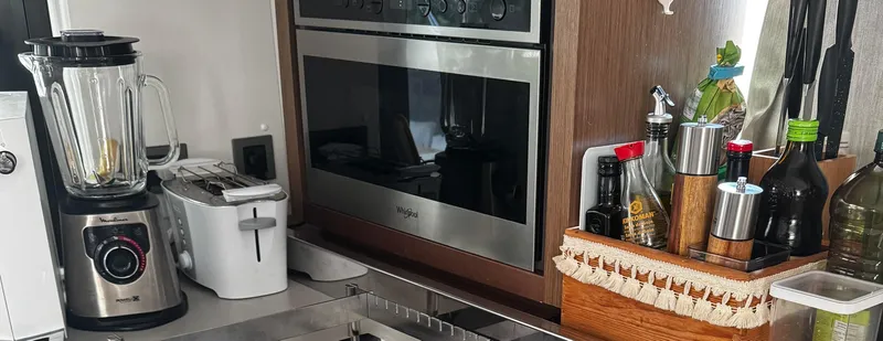 Samcat Yacht Photos Pics Modern kitchen in 2020 Lagoon 46 yacht with appliances and condiments.