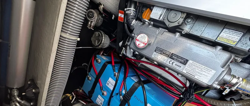 Samcat Yacht Photos Pics Engine compartment of 2020 Lagoon 46 catamaran with visible wiring and components.