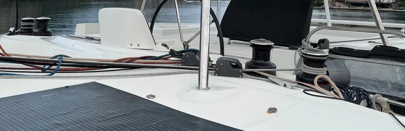 Samcat Yacht Photos Pics Deck view of a 2020 Lagoon 46 catamaran with ropes and winches.
