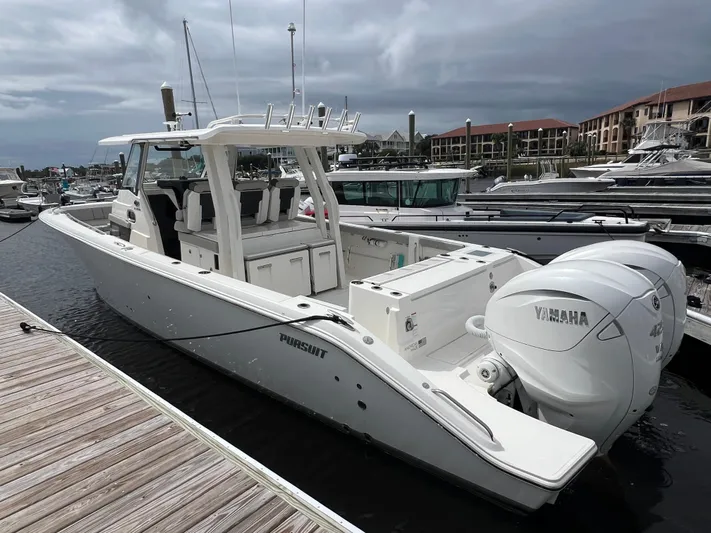  Yacht Photos Pics 2022 Pursuit S 358 Sport boat docked with twin Yamaha engines.