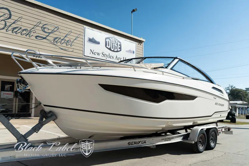 Ocean Phantom Yacht Photos Pics 2023 Hussar 850 boat on trailer outside Black Label Marine Group.