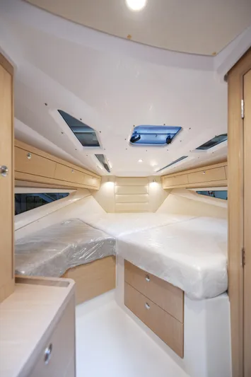 Ocean Phantom Yacht Photos Pics Luxurious interior of 2023 Hussar 850 yacht with modern design and ample natural light.