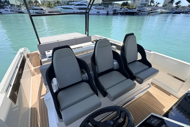 Casa - Ashanty Yacht Photos Pics 2025 De Antonio Yachts D32 interior with modern seating and sleek design.