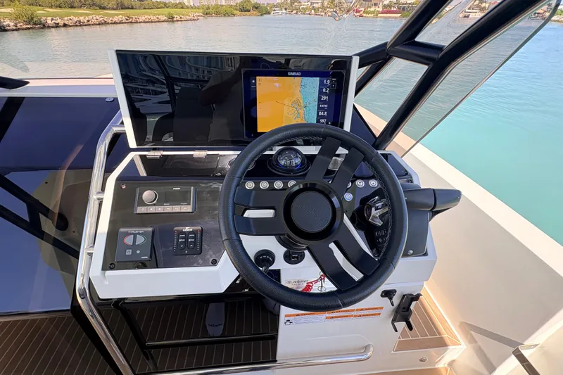 Casa - Ashanty Yacht Photos Pics Helm of 2025 De Antonio Yachts D32 with navigation display and controls.