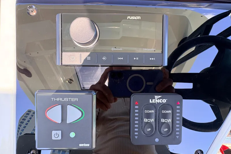Casa - Ashanty Yacht Photos Pics Control panel of 2025 De Antonio Yachts D32 featuring Fusion audio and thruster controls.