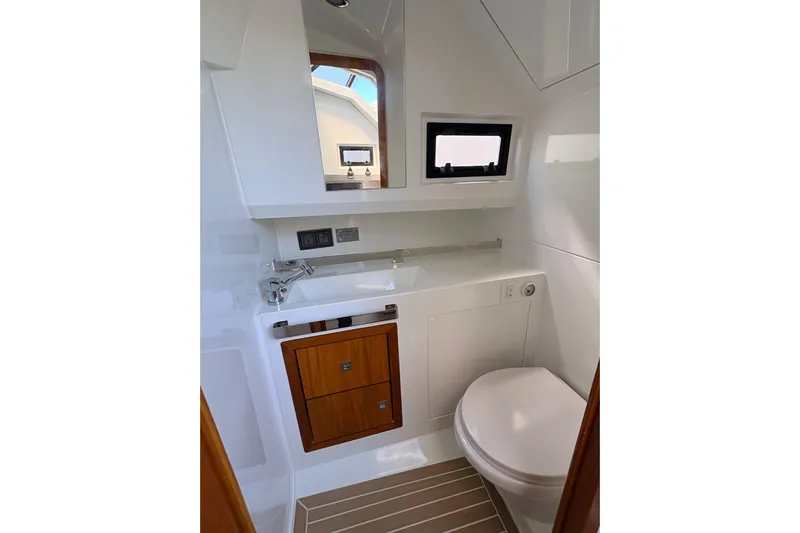 Casa - Ashanty Yacht Photos Pics Modern bathroom interior of 2025 De Antonio Yachts D32, featuring sleek design and compact amenities.