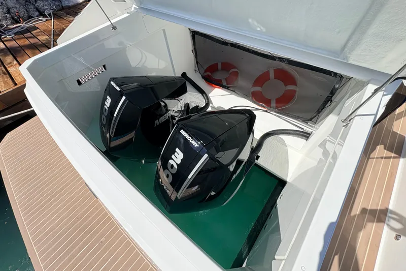 Casa - Ashanty Yacht Photos Pics 2025 De Antonio Yachts D32 with dual Mercury outboard engines and life rings.