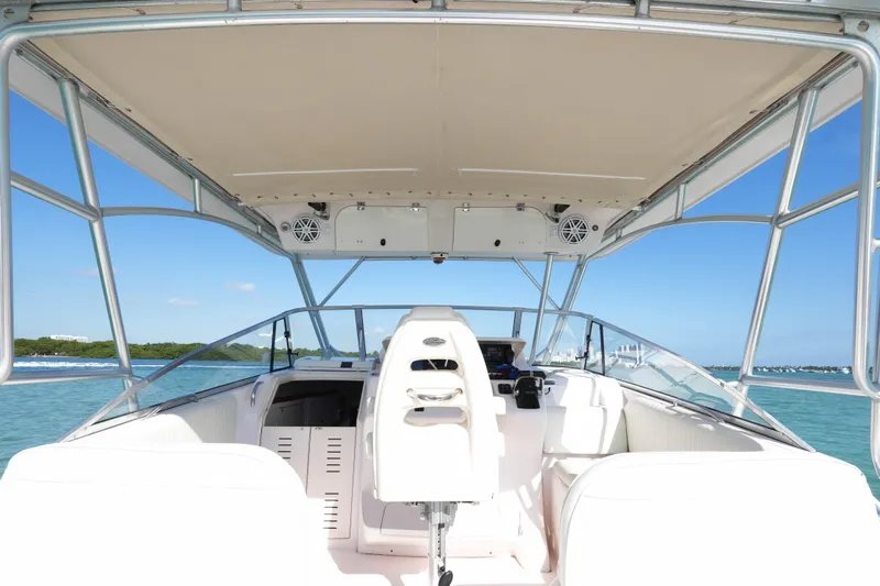  Yacht Photos Pics 2003 Grady-White Express 330 boat interior with helm, ocean view, and clear sky.