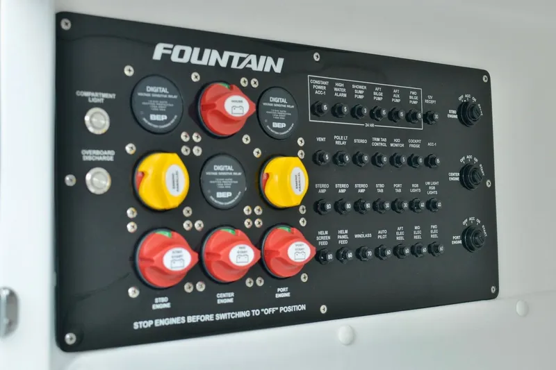  Yacht Photos Pics Control panel of 2024 Fountain 32 NX Sportfish boat with switches and dials.