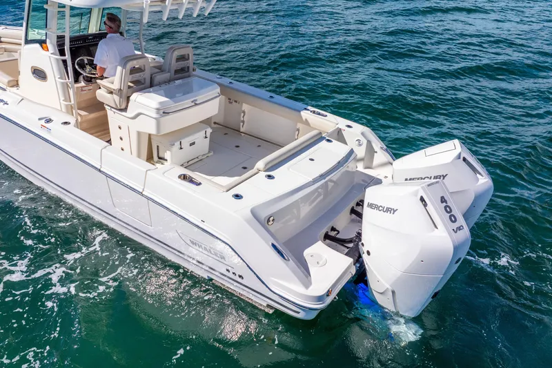 Bwce0715h122 Yacht Photos Pics 2022 Boston Whaler 330 Outrage boat with dual Mercury 400 engines on open water.