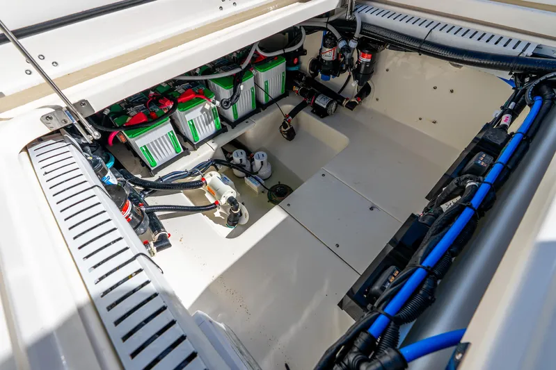 Bwce0715h122 Yacht Photos Pics 2022 Boston Whaler 330 Outrage engine compartment with batteries and wiring.