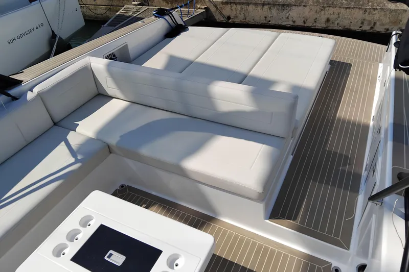  Yacht Photos Pics 2024 VanDutch 40 yacht interior with sleek white seating and modern design.