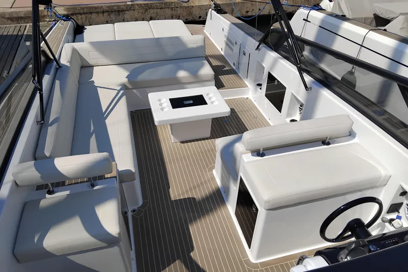  Yacht Photos Pics 2024 VanDutch 40 yacht interior with sleek white seating and modern design.