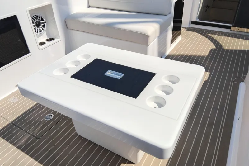  Yacht Photos Pics Luxury VanDutch 40 yacht interior, featuring a sleek table and seating, 2024 model.