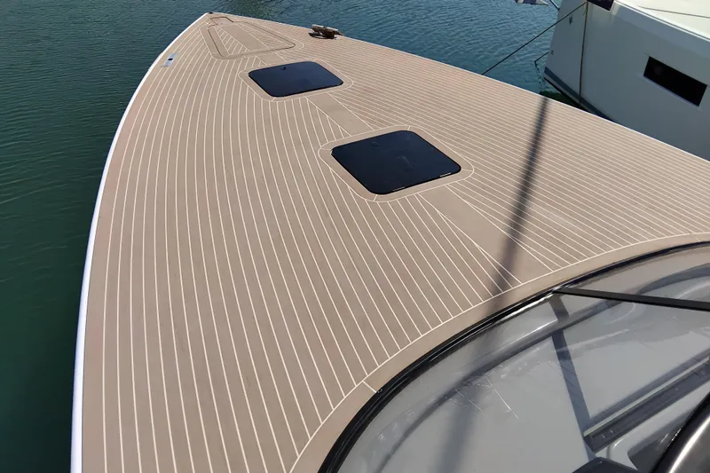  Yacht Photos Pics 2024 VanDutch 40 yacht deck with sleek, modern design and two hatches.