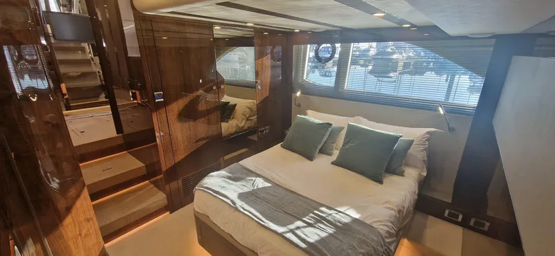 In Stock Yacht Photos Pics Luxurious bedroom interior of 2025 Fairline Targa 45 Open yacht with modern design.
