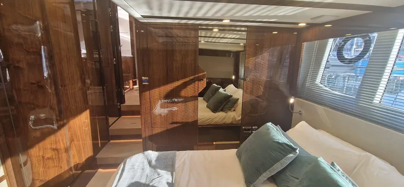 In Stock Yacht Photos Pics Luxurious interior of 2025 Fairline Targa 45 Open yacht with elegant wood finishes.