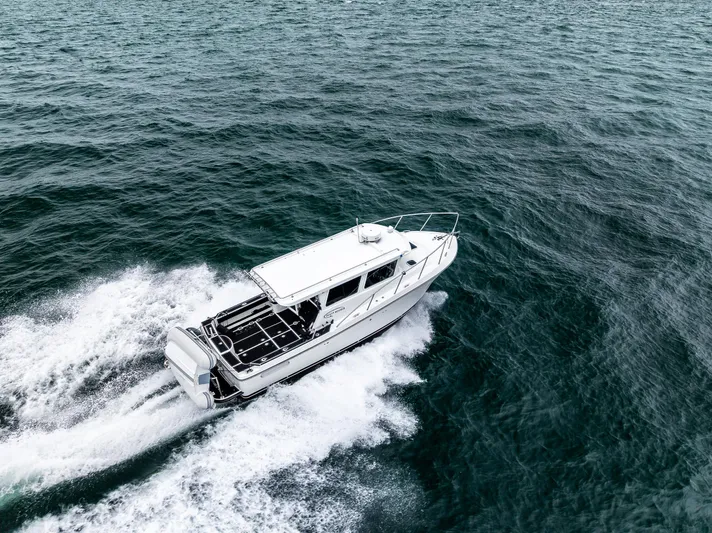 Ocean Roamer Yacht Photos Pics 2016 Lindell Ocean Roamer cruising on open water, aerial view.