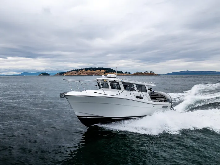 Ocean Roamer Yacht Photos Pics 2016 Lindell Ocean Roamer cruising on open water under cloudy skies.