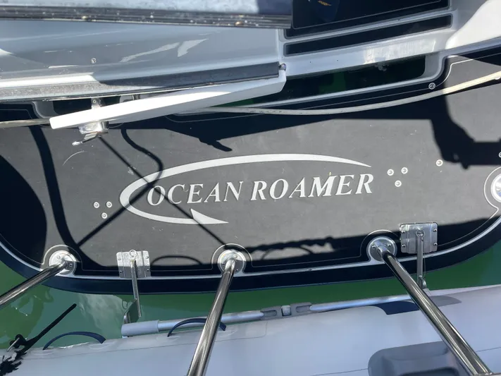 Ocean Roamer Yacht Photos Pics Lindell Ocean Roamer 2016 boat deck with logo and metal railings.