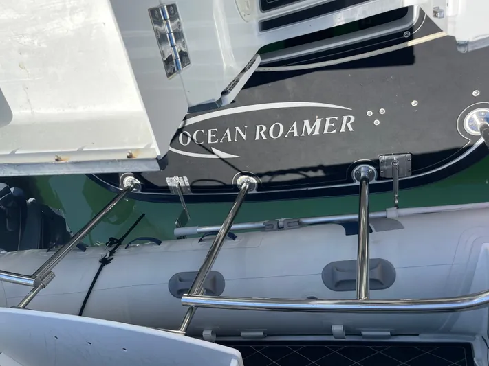 Ocean Roamer Yacht Photos Pics Lindell Ocean Roamer 2016 boat with swim platform and ladder in marina.