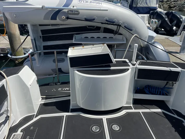 Ocean Roamer Yacht Photos Pics 2016 Lindell Ocean Roamer boat deck with inflatable dinghy and storage compartments.
