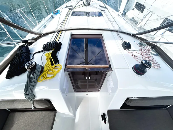 Rhythm & Blues Yacht Photos Pics 2024 Jeanneau Sun Odyssey 440 deck with ropes and winches, showcasing sleek design.