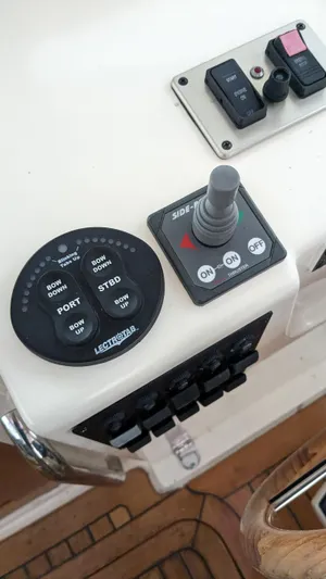 Sea Ranger Yacht Photos Pics Control panel of a 2008 Sabre 34 Express boat with joystick and switches.