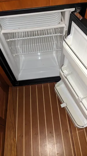 Sea Ranger Yacht Photos Pics 2008 Sabre 34 Express boat interior fridge with open door