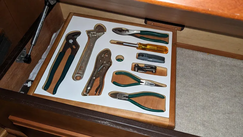 Sea Ranger Yacht Photos Pics Organized tool drawer in a 2008 Sabre 34 Express boat.