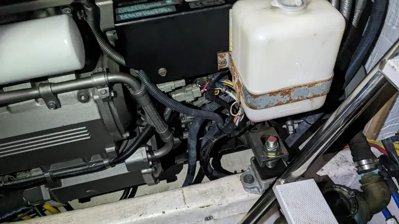 Sea Ranger Yacht Photos Pics Engine compartment of a 2008 Sabre 34 Express boat showing various components and wiring.