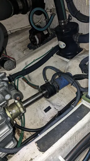 Sea Ranger Yacht Photos Pics Engine compartment of a 2008 Sabre 34 Express boat showing mechanical components and wiring.