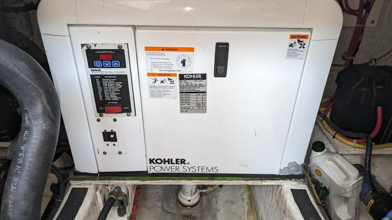 Sea Ranger Yacht Photos Pics Kohler Power Systems generator in a 2008 Sabre 34 Express boat engine room.