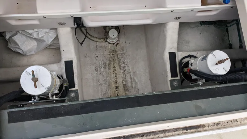 Sea Ranger Yacht Photos Pics Bilge area of a 2008 Sabre 34 Express boat with pumps and hoses.