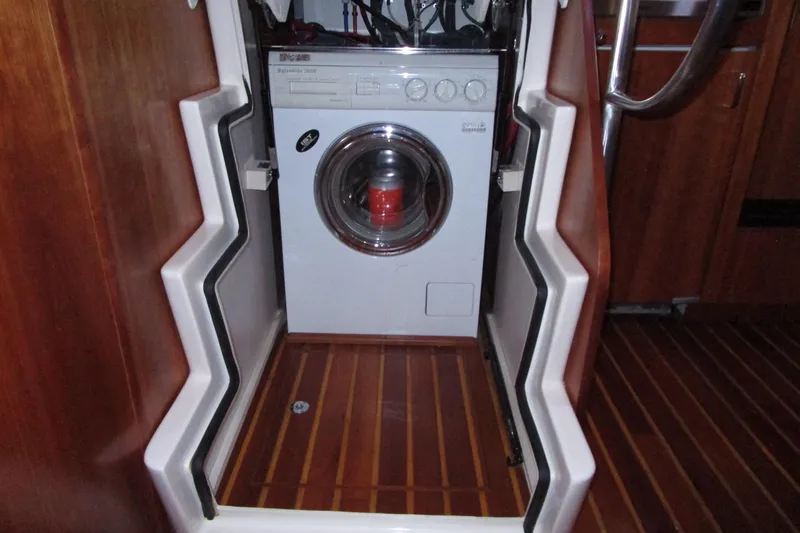 Endless Summer Yacht Photos Pics Washer and dryer under steps