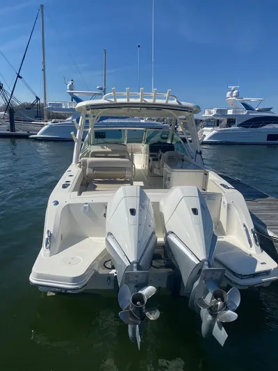  Yacht Photos Pics 2020 Boston Whaler 320 Vantage docked, rear view.