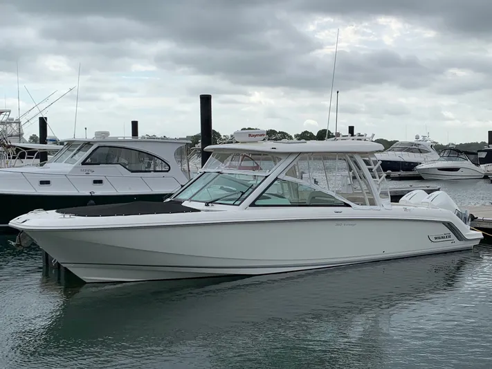  Yacht Photos Pics 2020 Boston Whaler 320 Vantage boat docked in harbor.
