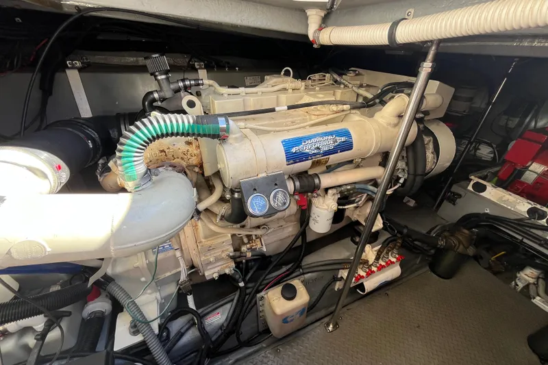 A Friend Like Me Yacht Photos Pics Engine room of 2000 Sea Ray 460 Sundancer, showcasing detailed mechanical components.