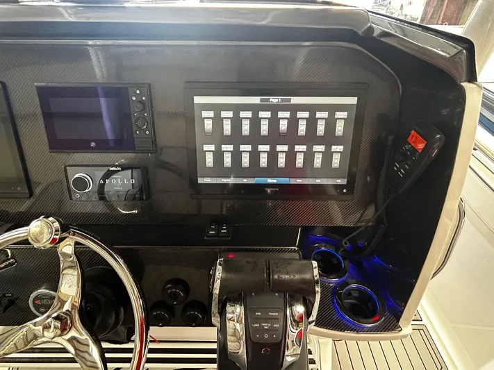  Yacht Photos Pics 2016 Nor-Tech 390 Sport dashboard with advanced controls and touchscreen display.