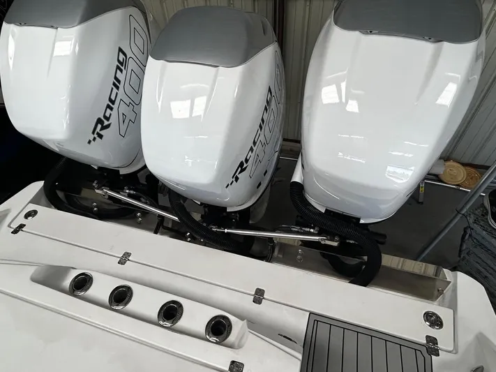  Yacht Photos Pics 2016 Nor-Tech 390 Sport boat with triple Racing 400 outboard engines.